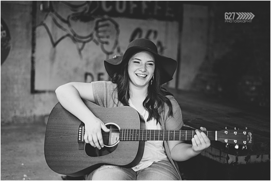 senior girl with guitar and floppy hat
