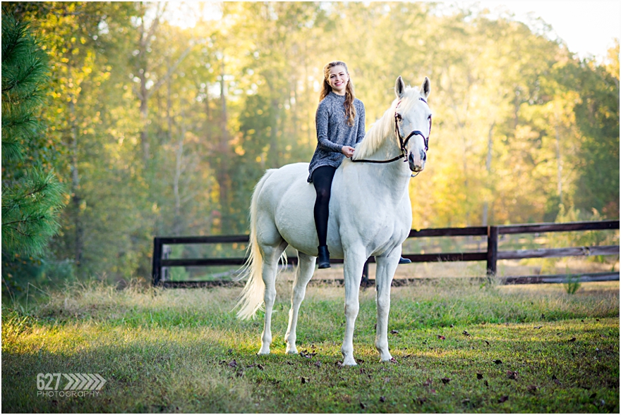 senior portraits with horse on farm