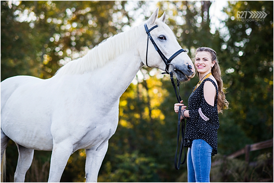 senior portraits with horse in the woods