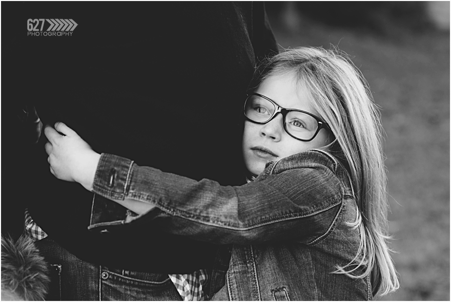 black and white little girl hugging dad