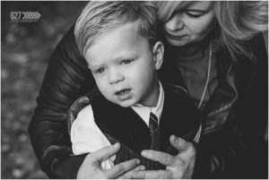 black and white mom hugging son