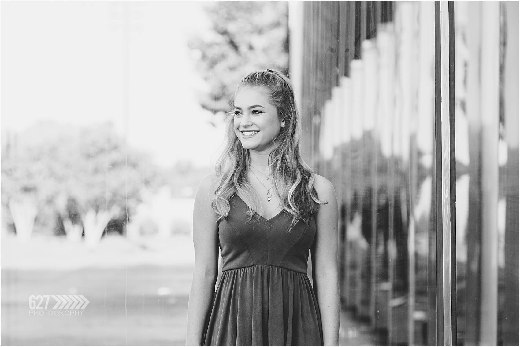 senior girl black and white photo smiling