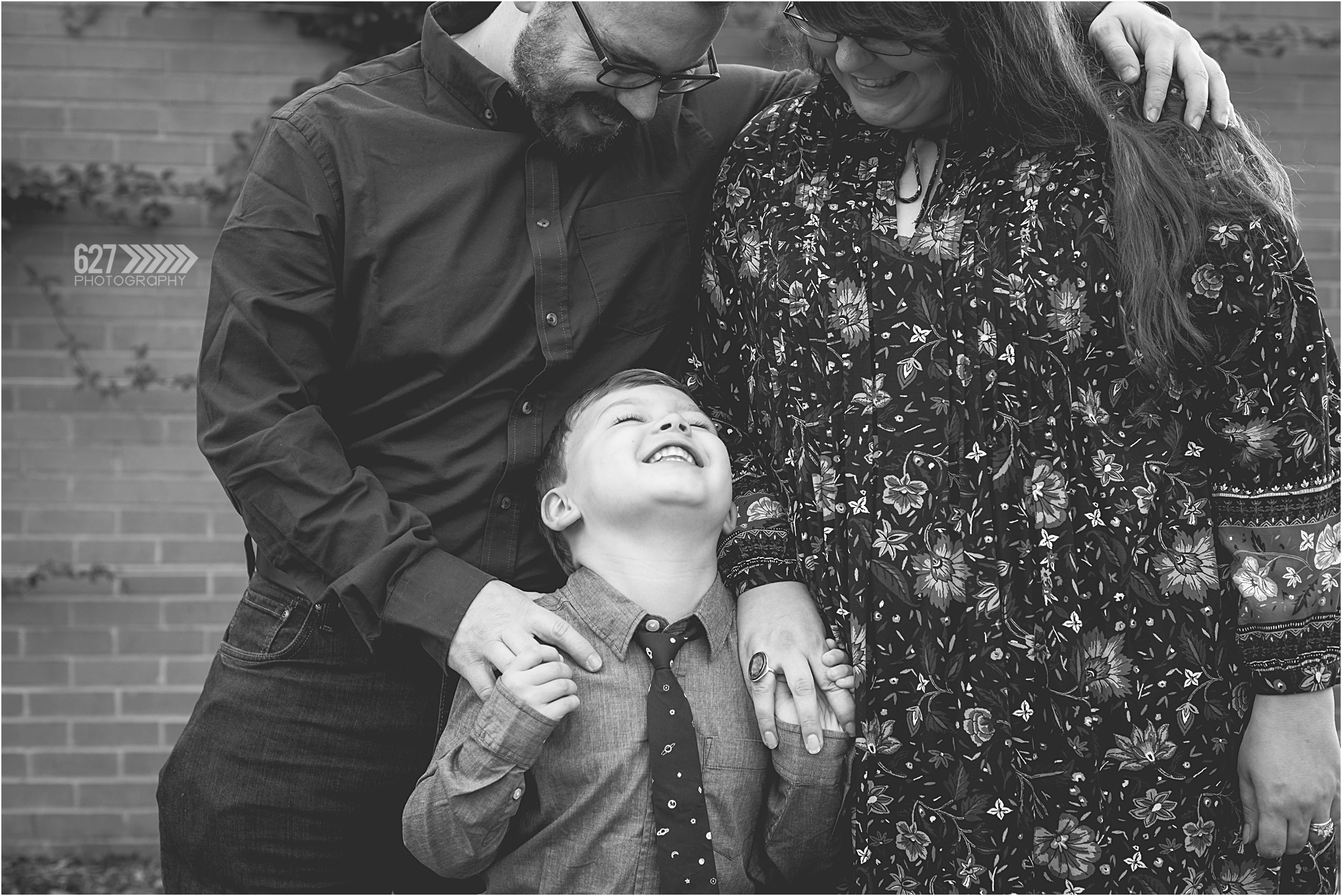 black and white family of 3 portrait