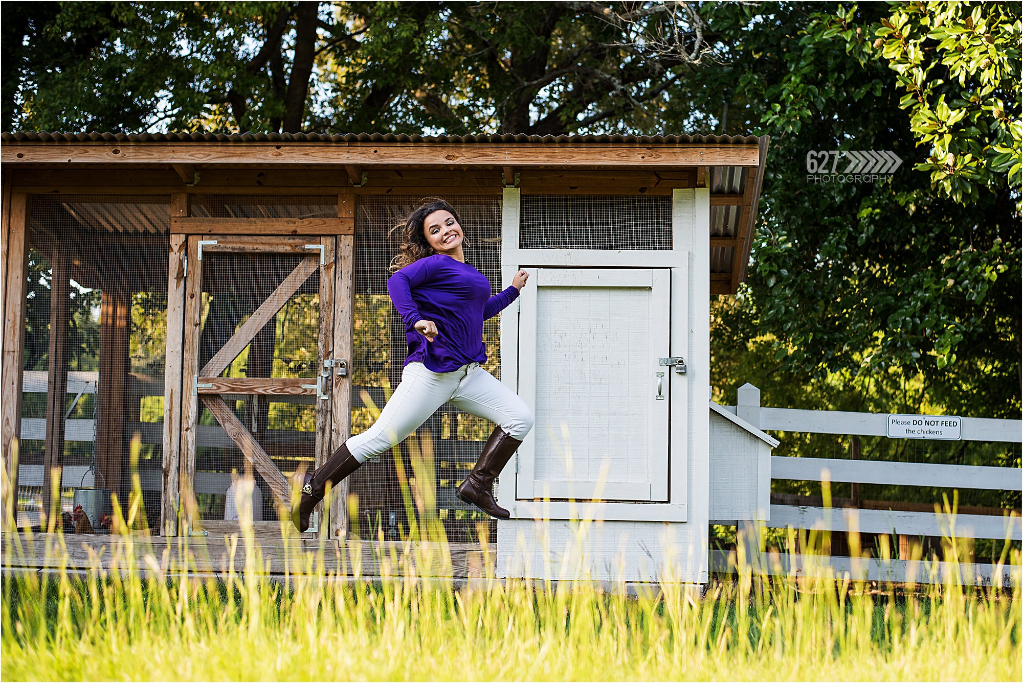 rustic senior portraits in front of barn