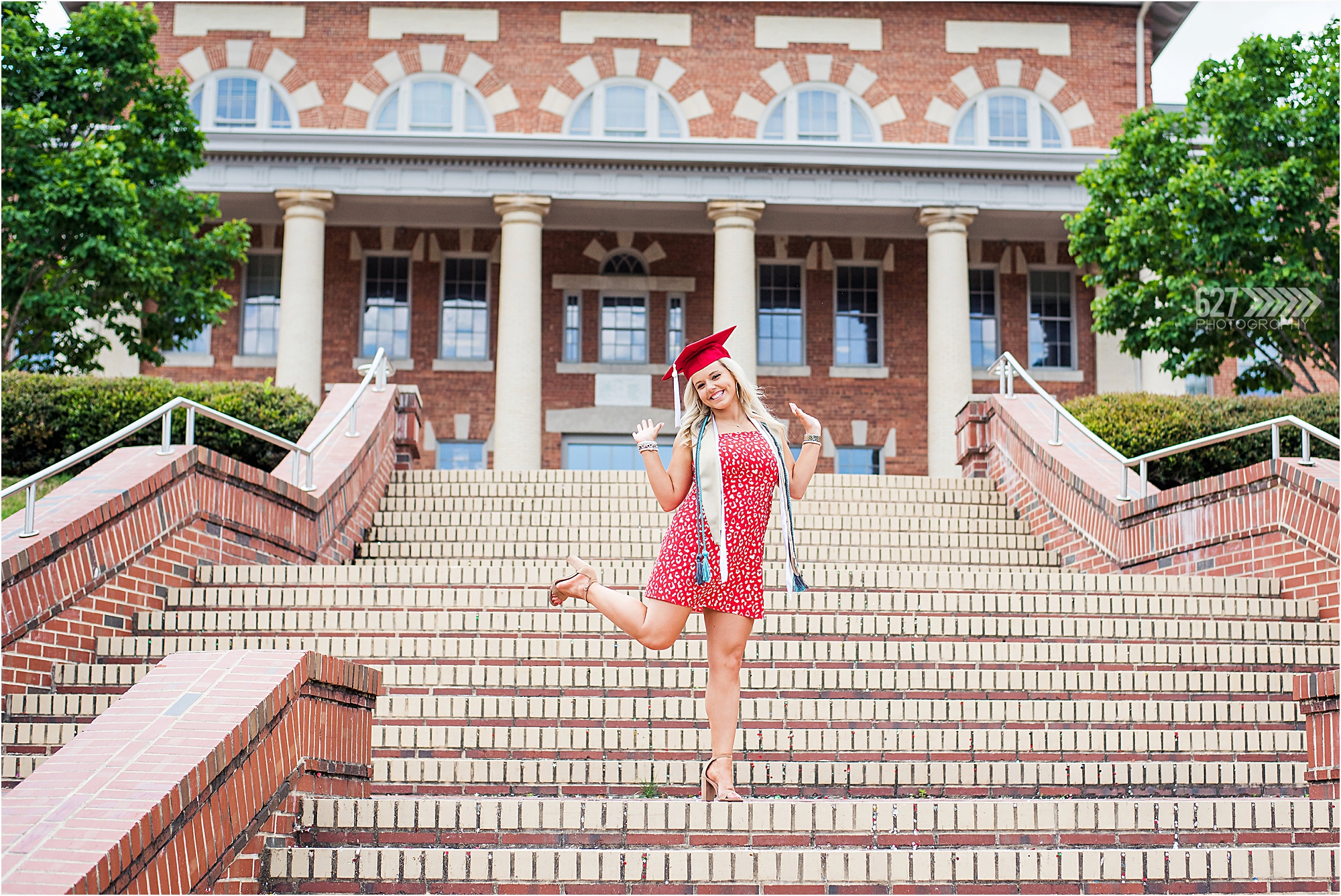 NCSU graduation portrait on steps at 1911 building