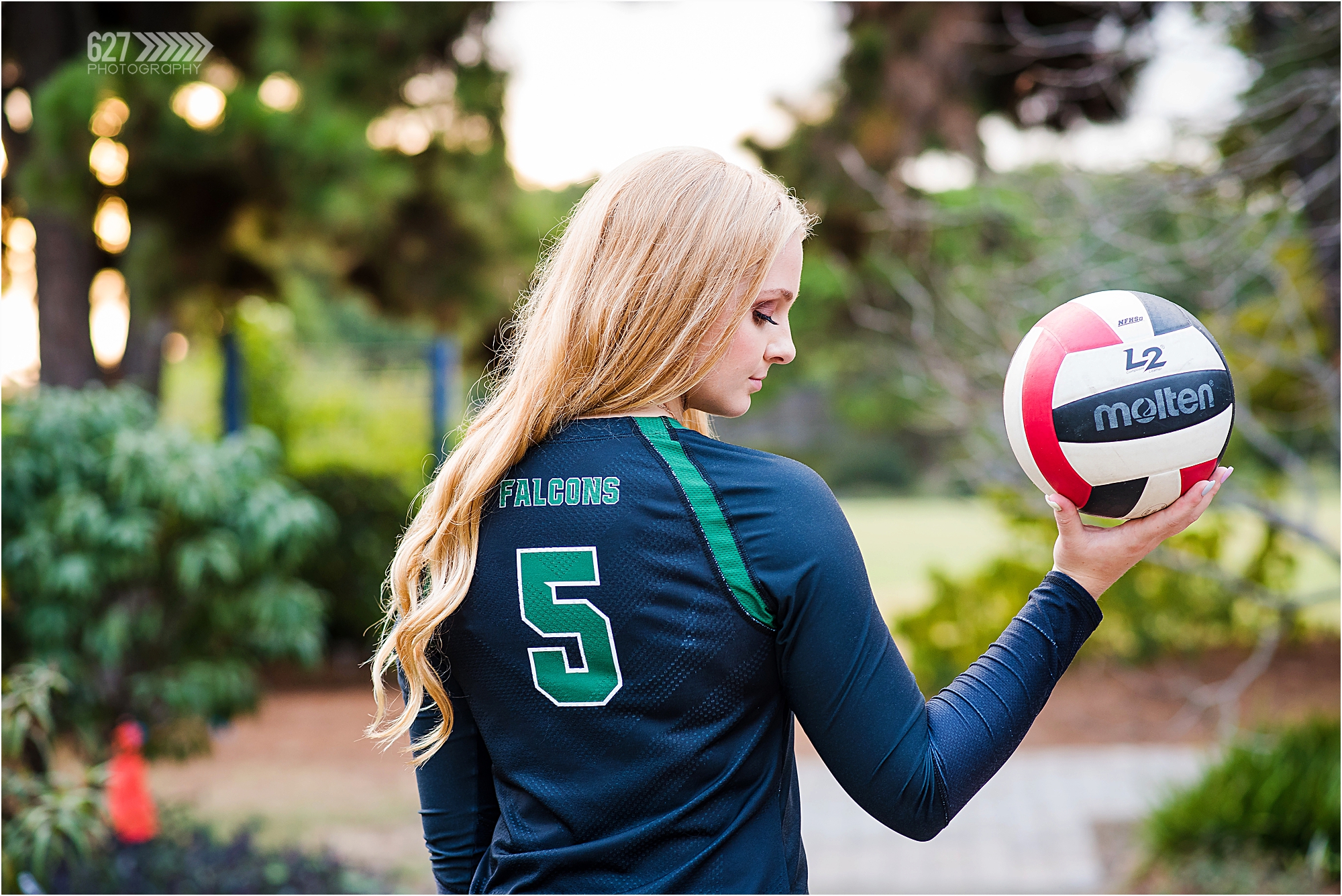senior girl with volleyball 