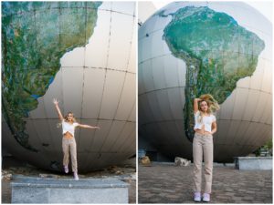 senior girl in front of globe museum of natural sciences in raleigh