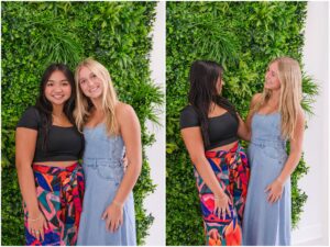 627 models at the fashion show in front of greenery wall