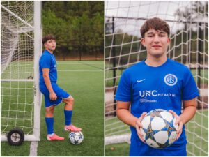 Natural senior photos of high school guy walking on soccer field in Apex North Carolina