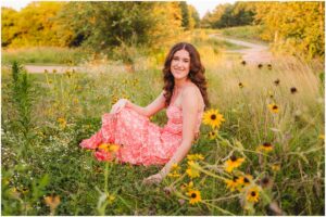 senior portraits with flowers in Raleigh NC at NCMA park