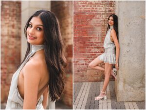 Senior girl posing in downtown Raleigh with brick architecture and natural light