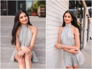 Senior girl posing in downtown Raleigh with brick architecture and natural light