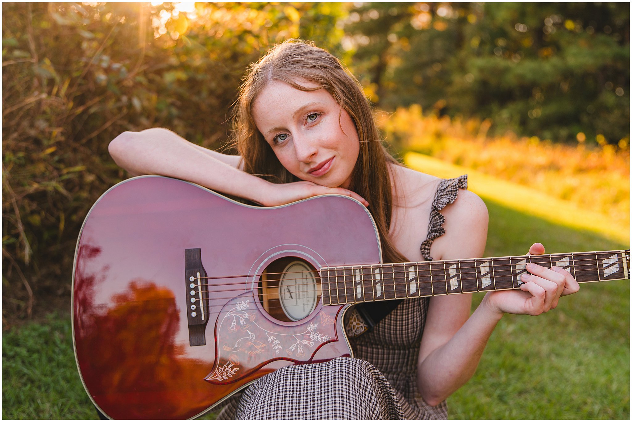 Senior girl portrait session with guitar at Lake Crabtree in Raleigh, North Carolina