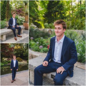 Holly Springs High School senior wearing a navy suit at Duke Gardens